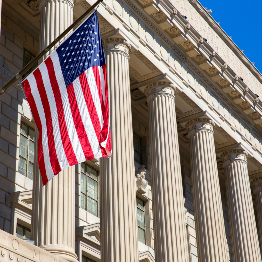 American flag outside of government office building