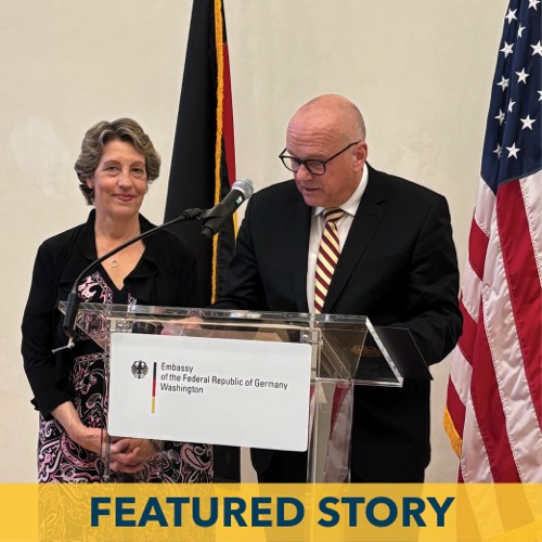 Hope M. Harrison was presented with the Cross of the Order of Merit of the Federal Republic of Germany by German Ambassador to the United States, Andreas Michaelis.